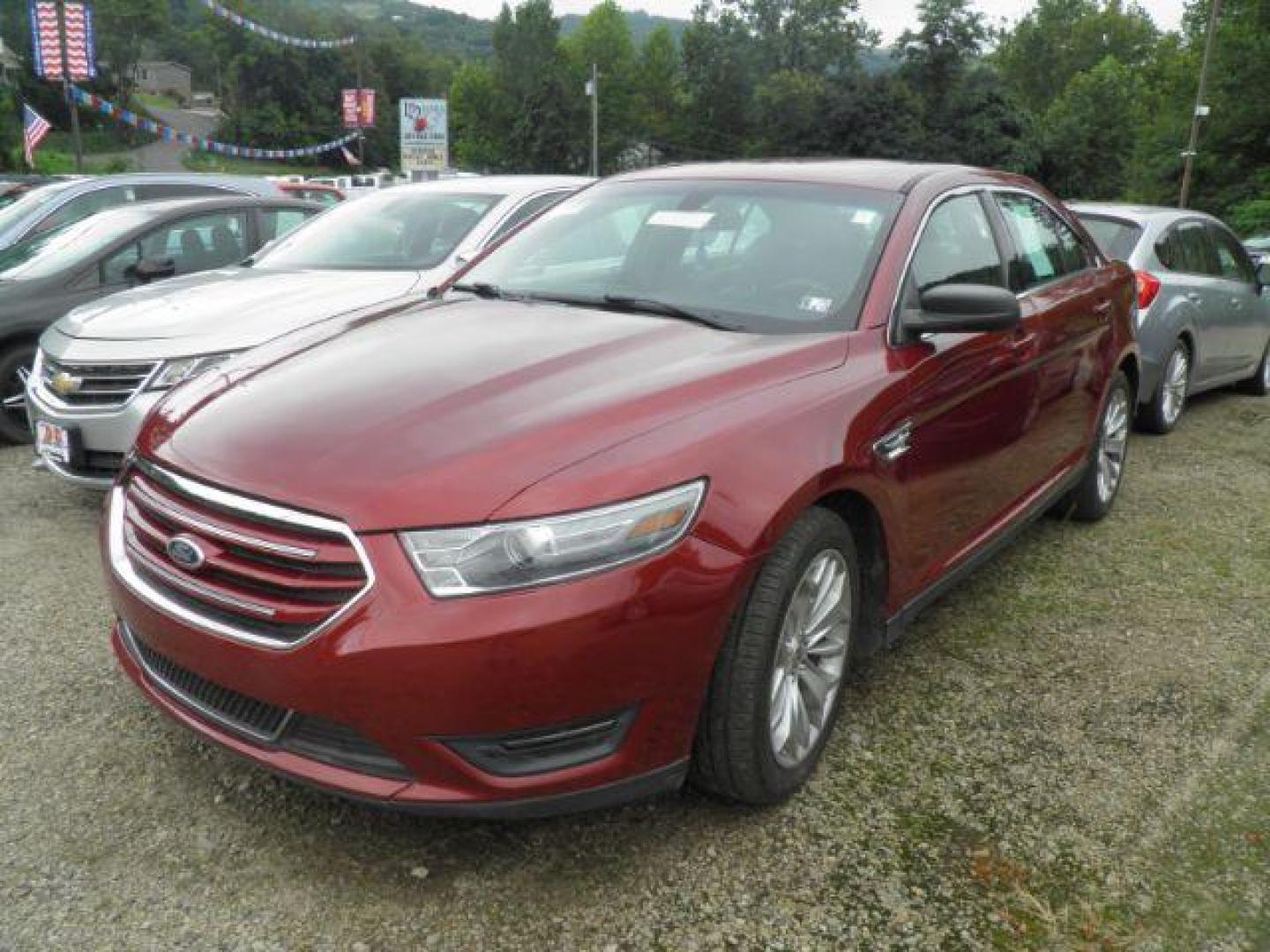 2014 ORANGE Ford Taurus Limited (1FAHP2F80EG) with an 2.4L L4 engine, AT transmission, located at 19521 New George's Creek Rd SW, Barton, MD, 21521, (301) 463-2404, 39.524323, -79.017906 - Photo#0
