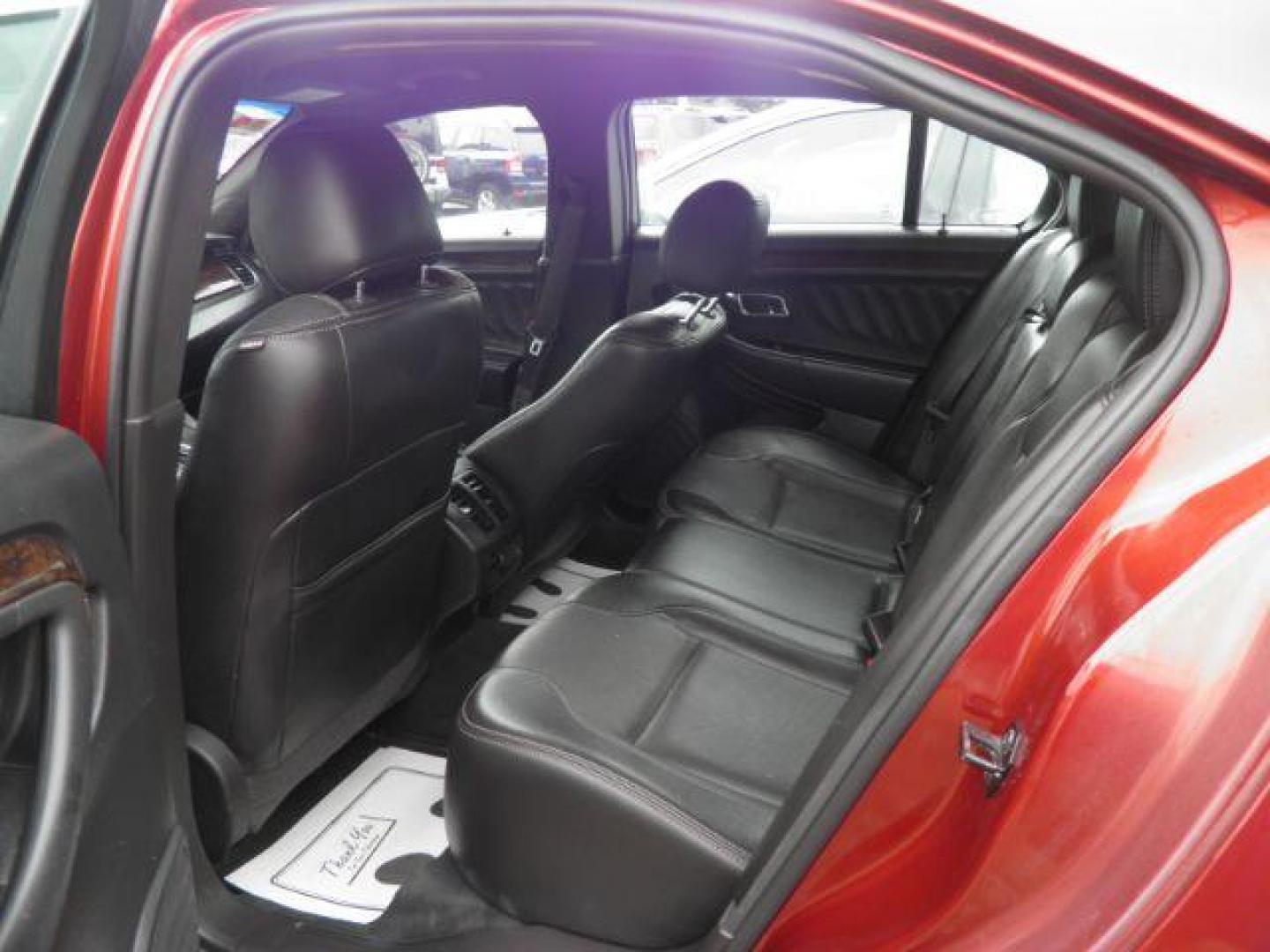 2014 ORANGE Ford Taurus Limited (1FAHP2F80EG) with an 2.4L L4 engine, AT transmission, located at 19521 New George's Creek Rd SW, Barton, MD, 21521, (301) 463-2404, 39.524323, -79.017906 - Photo#3