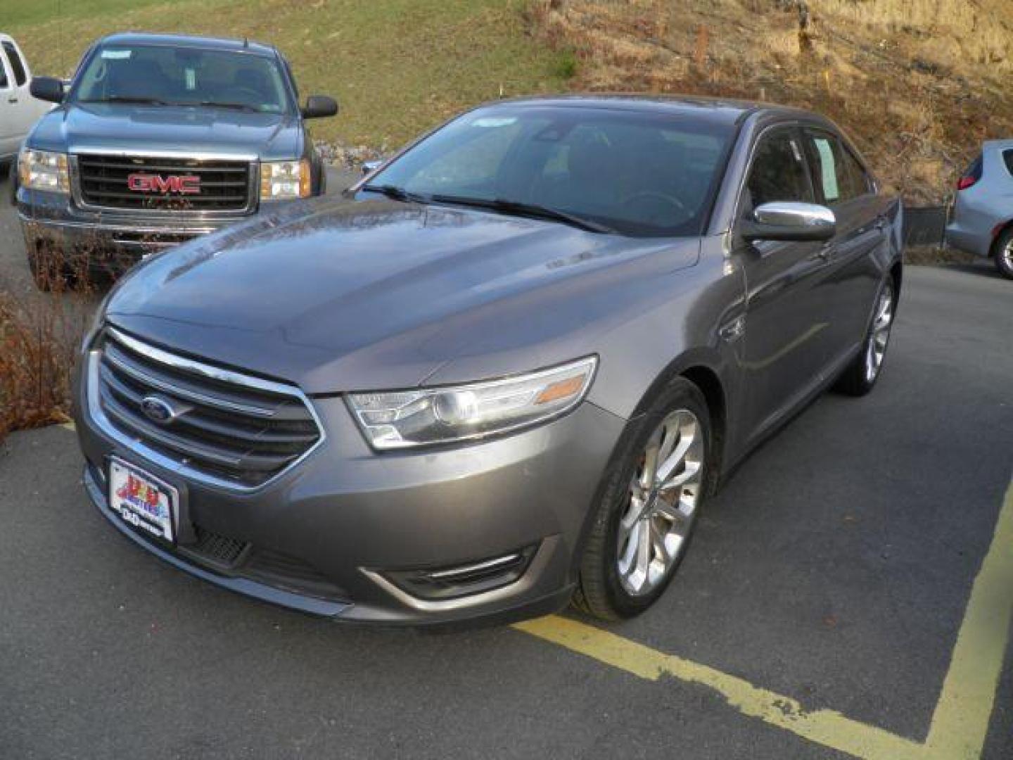 2014 Gray Ford Taurus Limited (1FAHP2J80EG) with an 3.5L V6 engine, AT transmission, located at 15520 McMullen Hwy SW, Belair, MD, 21502, (301) 729-3700, 39.581375, -78.846451 - Photo#0
