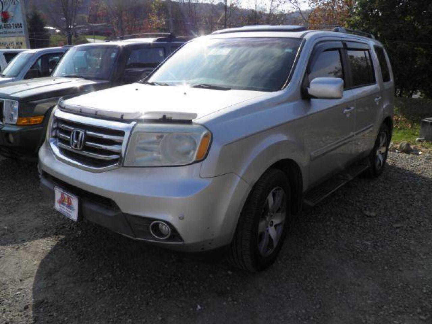 2014 SILVER Honda Pilot Touring 4WD 5-Spd AT with DVD (5FNYF4H94EB) with an 3.5L V6 engine, AT transmission, located at 19521 New George's Creek Rd SW, Barton, MD, 21521, (301) 463-2404, 39.524323, -79.017906 - Photo#0