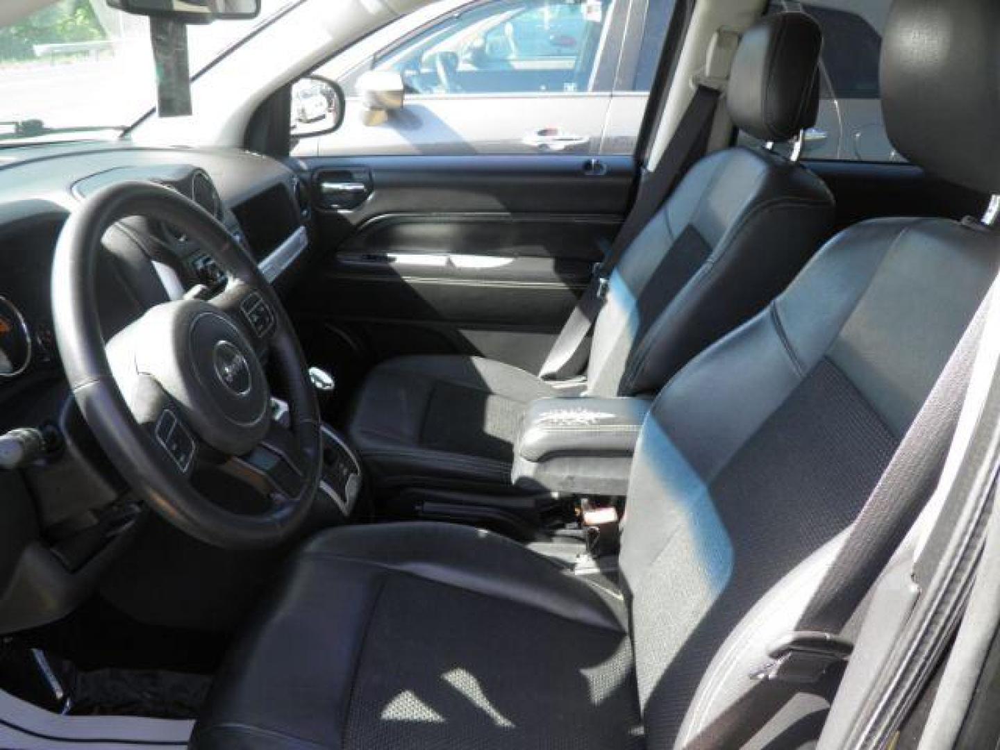 2014 BLACK Jeep Compass Latitude (1C4NJDEB7ED) with an 2.4L L4 engine, AT transmission, located at 15520 McMullen Hwy SW, Belair, MD, 21502, (301) 729-3700, 39.581375, -78.846451 - Photo#1