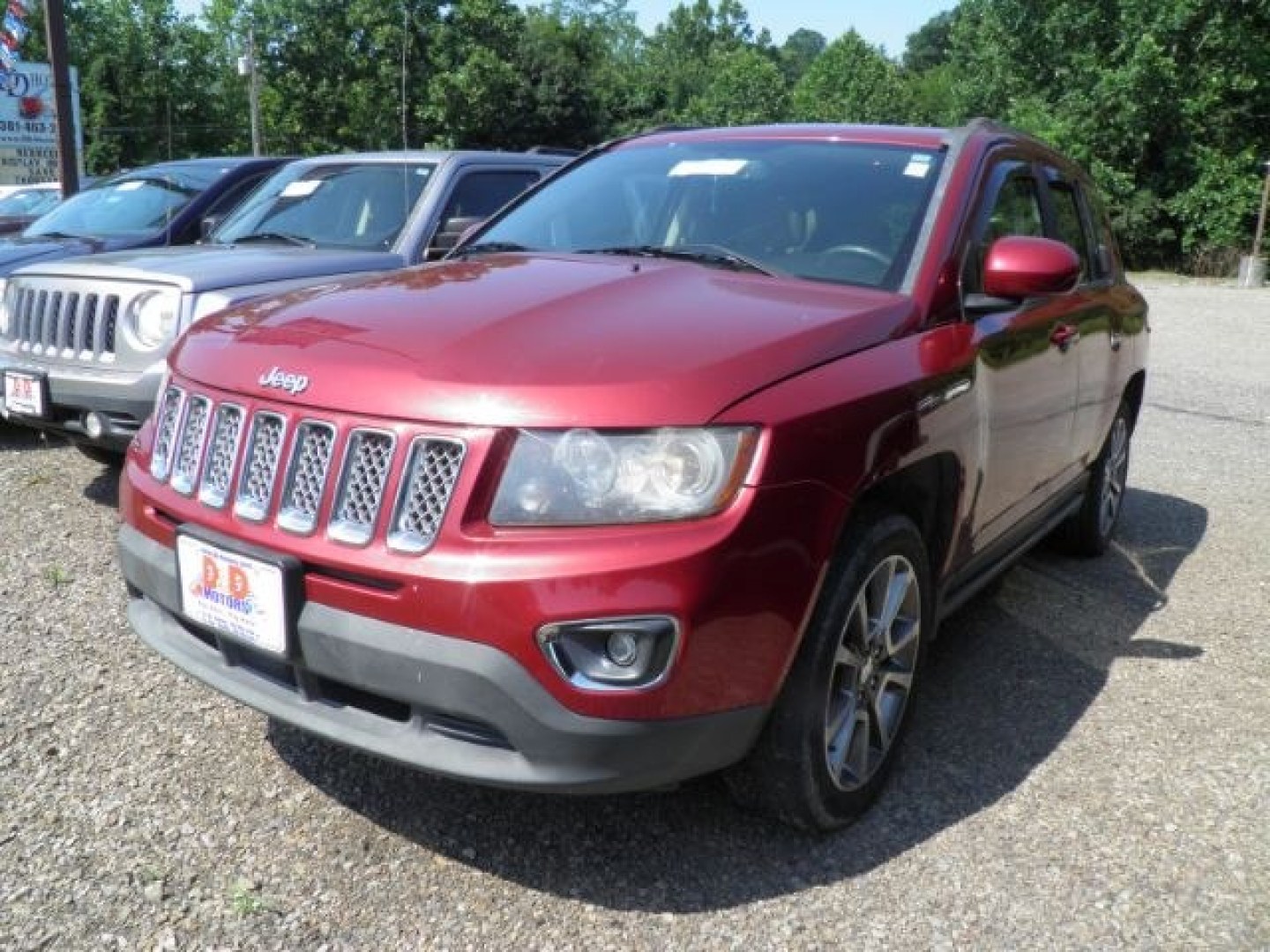 2014 RED Jeep Compass Limited (1C4NJDCB2ED) with an 2.4L L4 engine, AT transmission, located at 19521 New George's Creek Rd SW, Barton, MD, 21521, (301) 463-2404, 39.524323, -79.017906- Photo#0