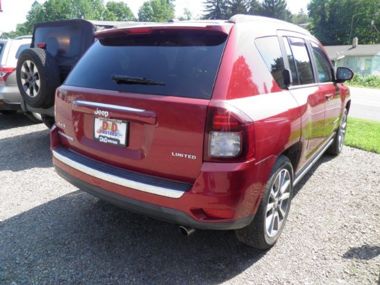 2014 RED Jeep Compass Limited (1C4NJDCB2ED) with an 2.4L L4 engine, AT transmission, located at 19521 New George's Creek Rd SW, Barton, MD, 21521, (301) 463-2404, 39.524323, -79.017906- Photo#5