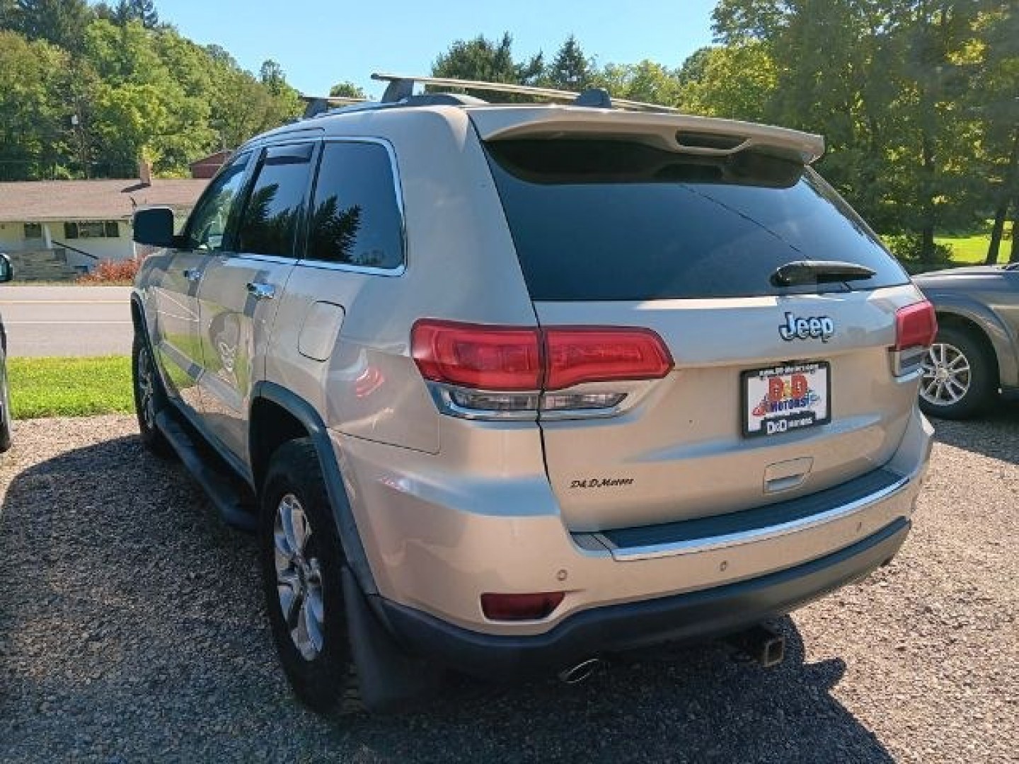 2014 TAN Jeep Grand Cherokee Limited (1C4RJFBG2EC) with an 3.6L V6 engine, AT transmission, located at 19521 New George's Creek Rd SW, Barton, MD, 21521, (301) 463-2404, 39.524323, -79.017906- Photo#4