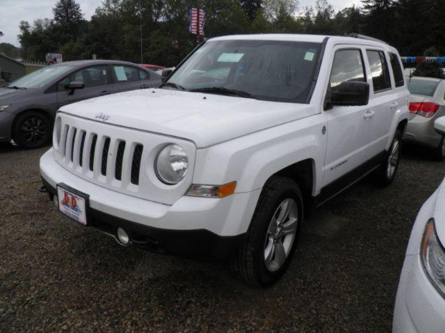 2014 WHITE Jeep Patriot Limited 4WD (1C4NJRCB2ED) with an 2.4L L4 engine, AT transmission, located at 19521 New George's Creek Rd SW, Barton, MD, 21521, (301) 463-2404, 39.524323, -79.017906 - Photo#0