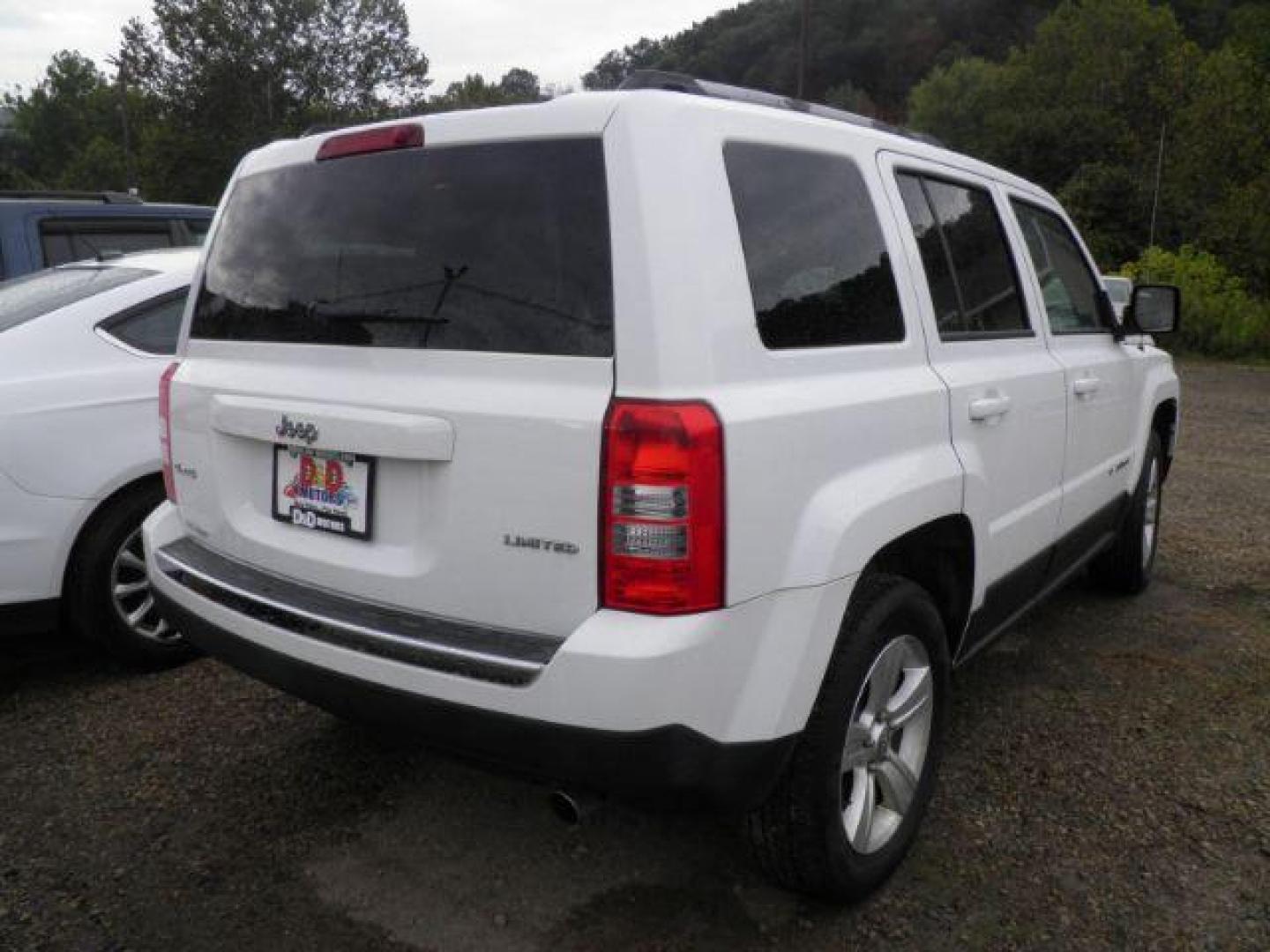 2014 WHITE Jeep Patriot Limited 4WD (1C4NJRCB2ED) with an 2.4L L4 engine, AT transmission, located at 19521 New George's Creek Rd SW, Barton, MD, 21521, (301) 463-2404, 39.524323, -79.017906 - Photo#5
