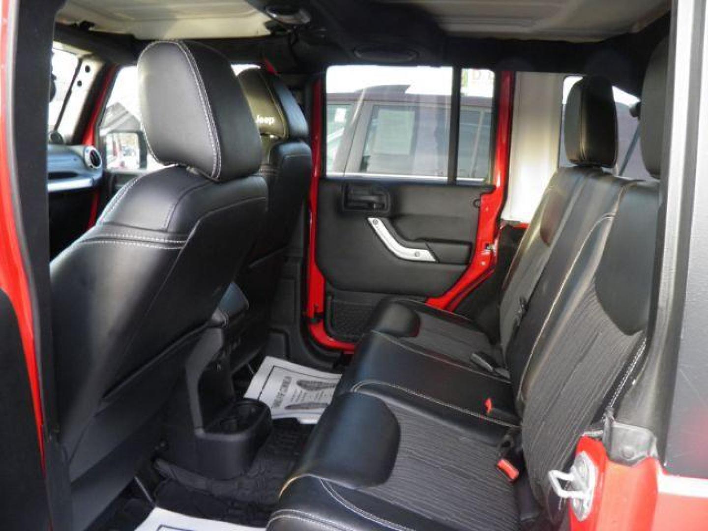 2014 Red Jeep Wrangler Unlimited Freedom Edition (1C4BJWDGXEL) with an 3.6L V6 engine, AT transmission, located at 15520 McMullen Hwy SW, Belair, MD, 21502, (301) 729-3700, 39.581375, -78.846451 - Photo#3