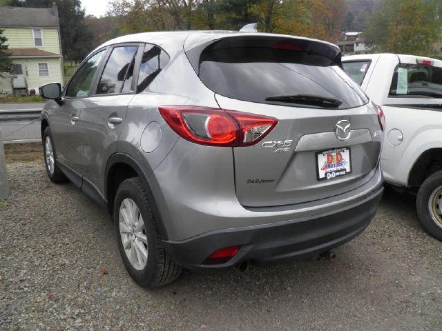 2014 SILVER Mazda CX-5 Touring (JM3KE4CY4E0) with an 2.5 L4 engine, AT transmission, located at 19521 New George's Creek Rd SW, Barton, MD, 21521, (301) 463-2404, 39.524323, -79.017906 - Photo#5