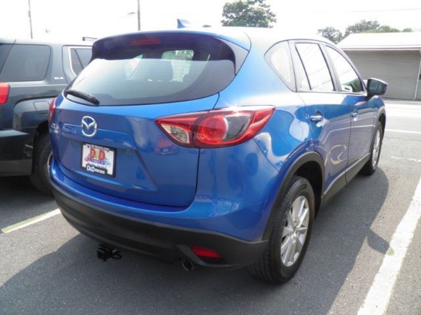 2014 BLUE Mazda CX-5 Sport (JM3KE4BE1E0) with an 2.4L L4 engine, located at 15520 McMullen Hwy SW, Belair, MD, 21502, (301) 729-3700, 39.581375, -78.846451- Photo#5