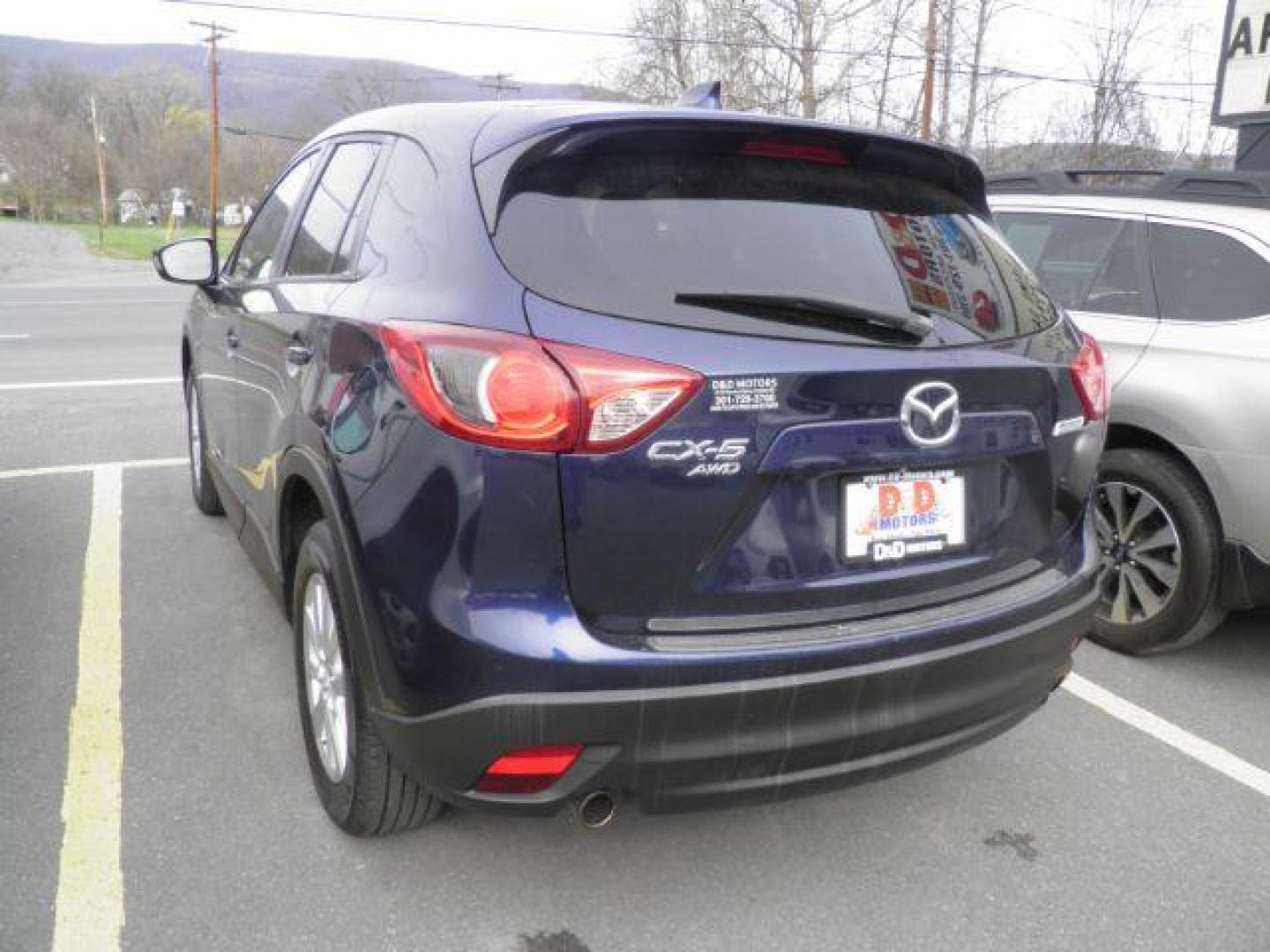 2014 BLUE Mazda CX-5 Touring AWD (JM3KE4CY2E0) with an 2.5 L4 engine, AT transmission, located at 19521 New George's Creek Rd SW, Barton, MD, 21521, (301) 463-2404, 39.524323, -79.017906 - Photo#5