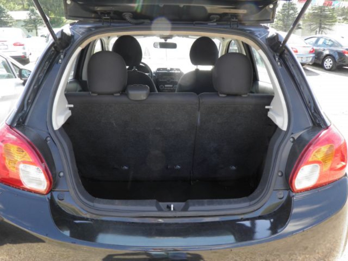 2014 Black Mitsubishi Mirage ES (ML32A3HJ2EH) with an 1.2L I3 engine, AT transmission, located at 19521 New George's Creek Rd SW, Barton, MD, 21521, (301) 463-2404, 39.524323, -79.017906- Photo#3