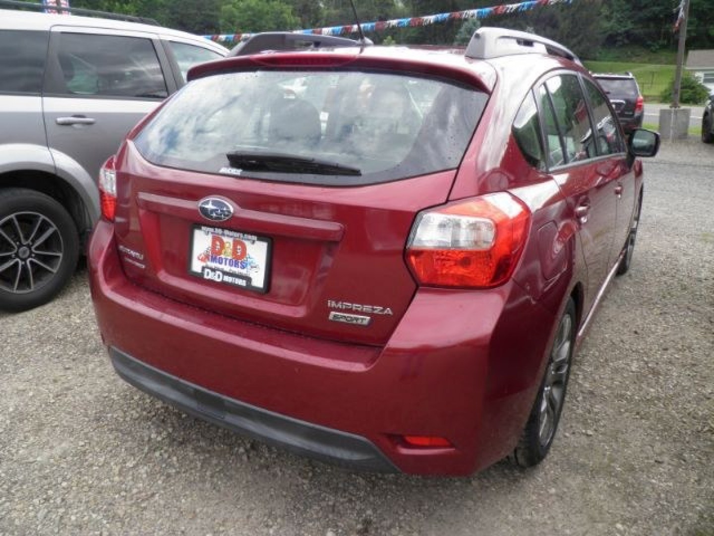 2014 RED Subaru Impreza 2.0i Sport Premium (JF1GPAL69EH) with an 2.4L L4 engine, CVT transmission, located at 19521 New George's Creek Rd SW, Barton, MD, 21521, (301) 463-2404, 39.524323, -79.017906- Photo#5