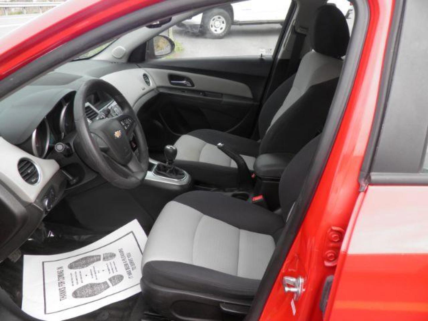 2015 Red Chevrolet Cruze LS Manual (1G1PB5SG9F7) with an 1.8L I4 engine, MAN transmission, located at 15520 McMullen Hwy SW, Belair, MD, 21502, (301) 729-3700, 39.581375, -78.846451 - Photo#1