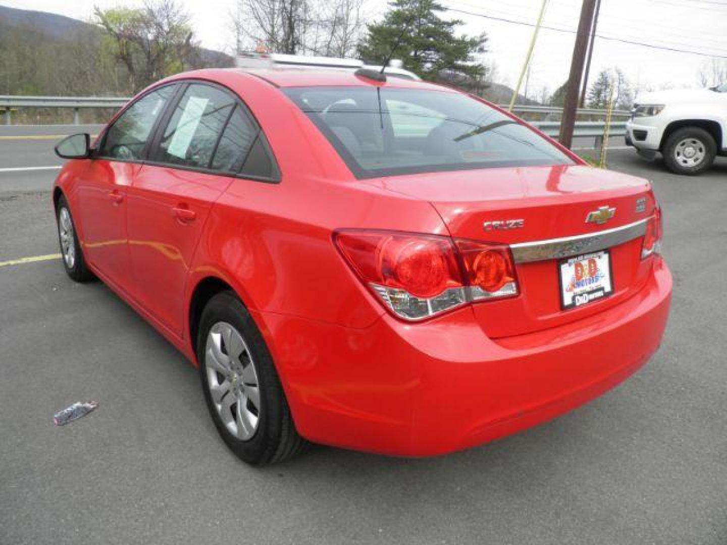 2015 Red Chevrolet Cruze LS Manual (1G1PB5SG9F7) with an 1.8L I4 engine, MAN transmission, located at 15520 McMullen Hwy SW, Belair, MD, 21502, (301) 729-3700, 39.581375, -78.846451 - Photo#4
