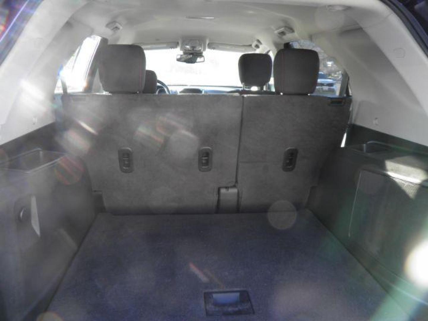 2015 Red Chevrolet Equinox 1LT (1GNFLFEK0FZ) with an 2.4L I4 engine, AT transmission, located at 15520 McMullen Hwy SW, Belair, MD, 21502, (301) 729-3700, 39.581375, -78.846451 - Photo#4