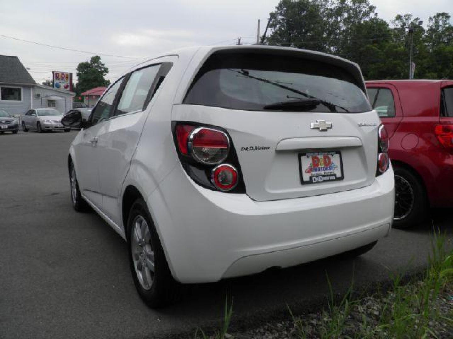 2015 White Chevrolet Sonic LT Auto 5-Door (1G1JC6SG0F4) with an 1.8L I4 engine, AT transmission, located at 19521 New George's Creek Rd SW, Barton, MD, 21521, (301) 463-2404, 39.524323, -79.017906 - Photo#5