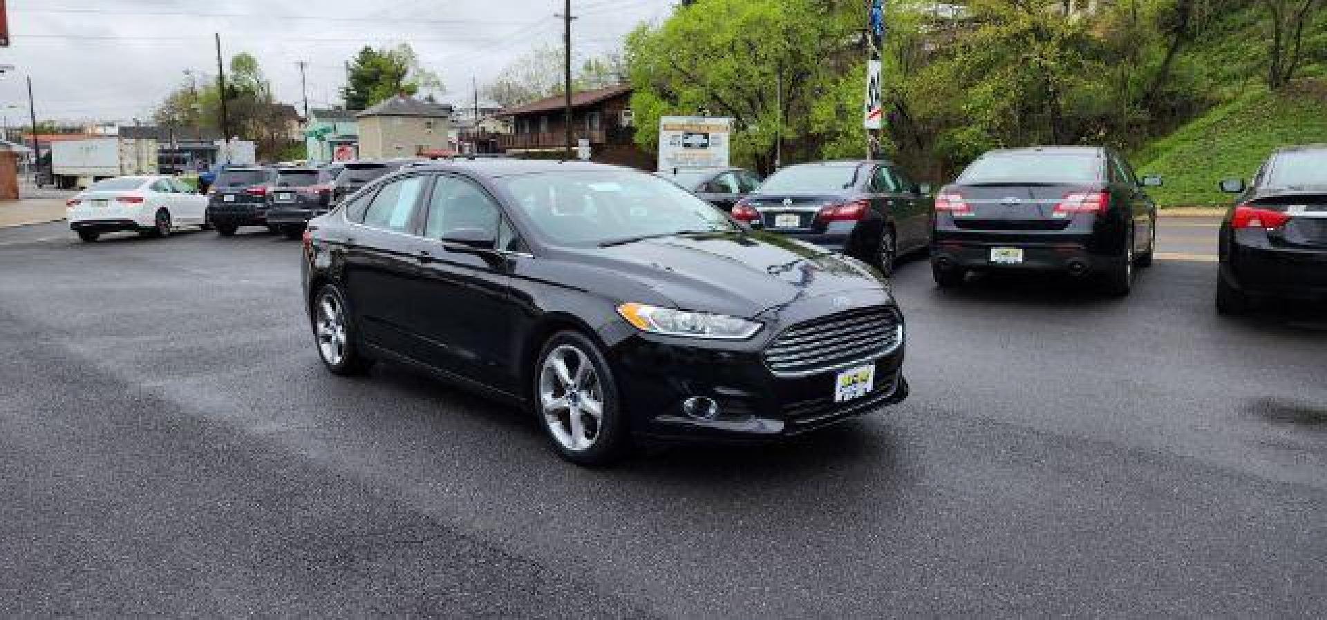 2015 BLACK /Charcoal Black Ford Fusion SE (3FA6P0H70FR) with an 2.5 L4 engine, AT transmission, located at 15520 McMullen Hwy SW, Belair, MD, 21502, (301) 729-3700, 39.581375, -78.846451 - FOR A BETTER PRICE CALL PAUL AT 301-268-8150 - Photo#0