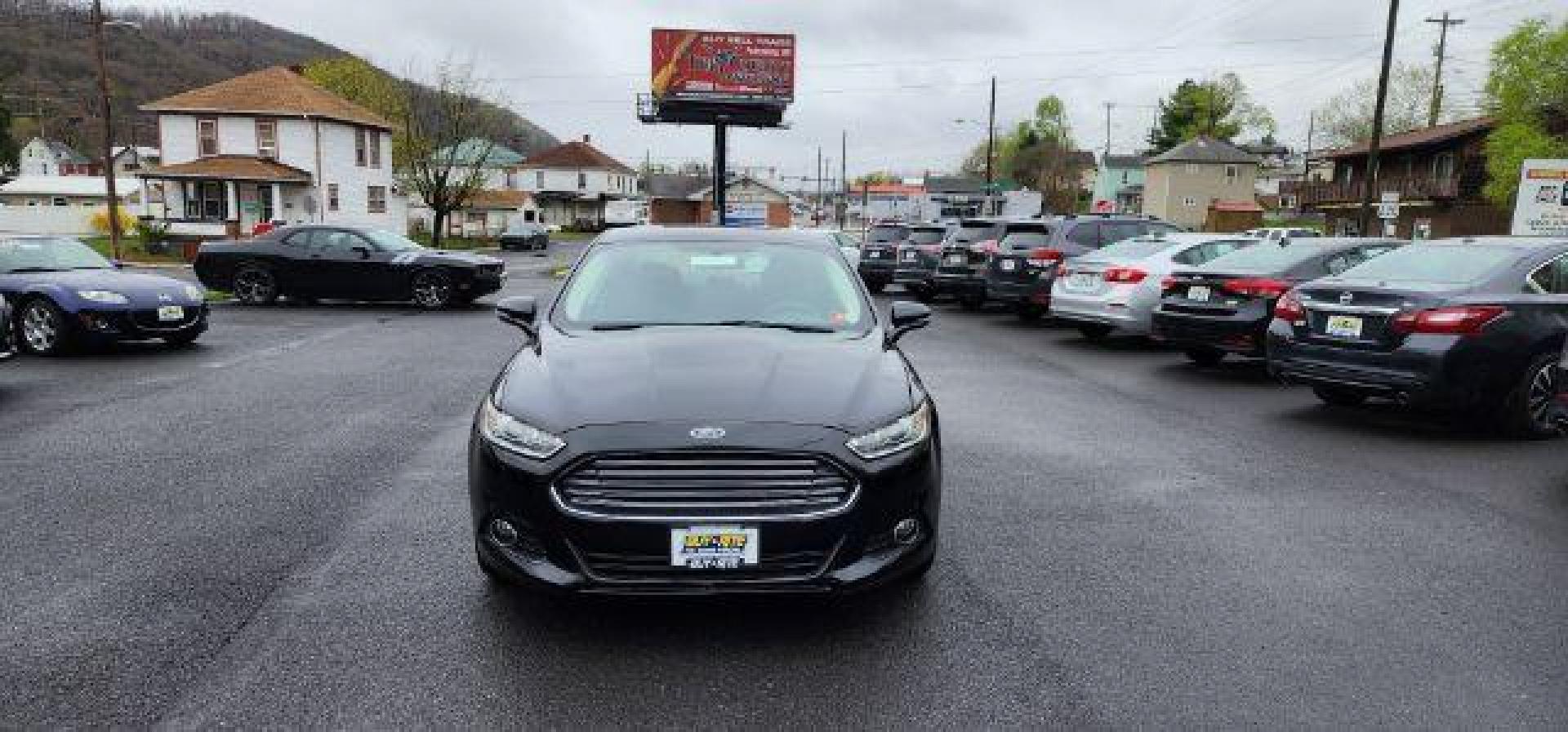2015 BLACK /Charcoal Black Ford Fusion SE (3FA6P0H70FR) with an 2.5 L4 engine, AT transmission, located at 15520 McMullen Hwy SW, Belair, MD, 21502, (301) 729-3700, 39.581375, -78.846451 - FOR A BETTER PRICE CALL PAUL AT 301-268-8150 - Photo#1
