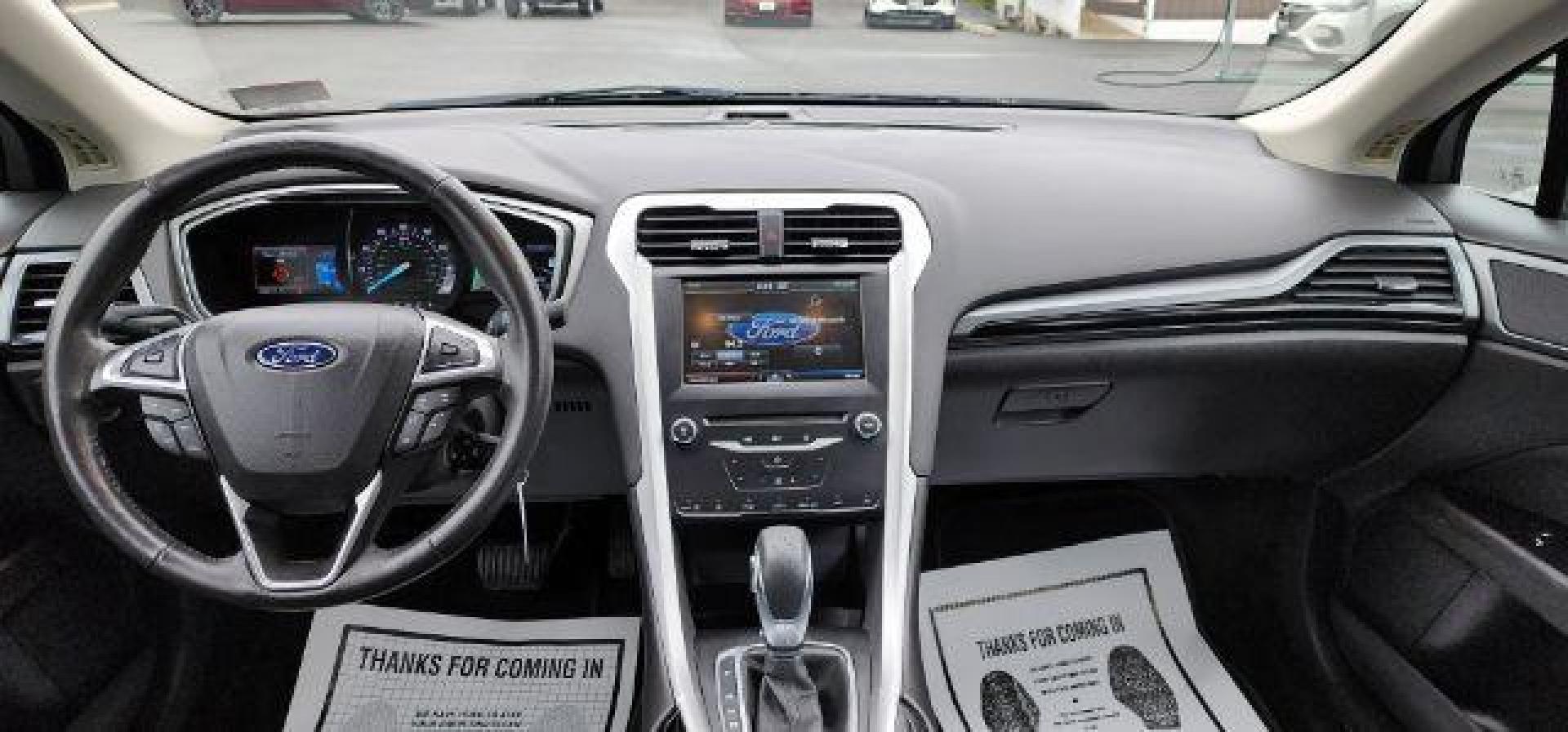 2015 BLACK /Charcoal Black Ford Fusion SE (3FA6P0H70FR) with an 2.5 L4 engine, AT transmission, located at 15520 McMullen Hwy SW, Belair, MD, 21502, (301) 729-3700, 39.581375, -78.846451 - FOR A BETTER PRICE CALL PAUL AT 301-268-8150 - Photo#6