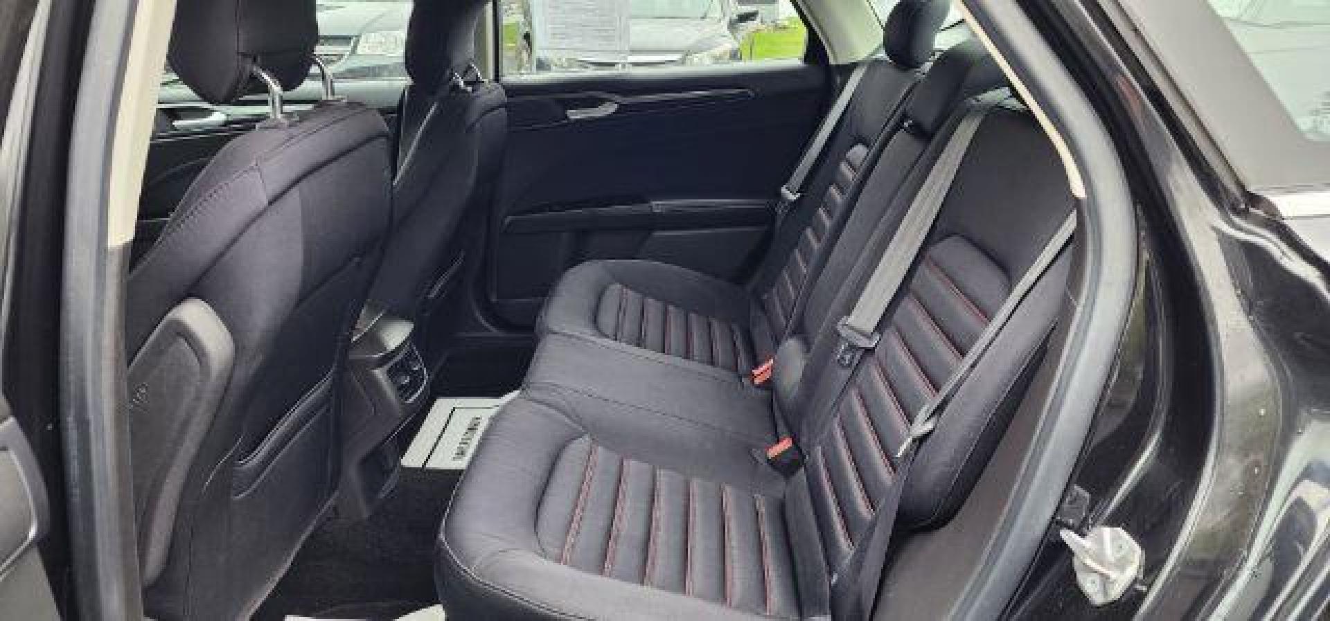 2015 BLACK /Charcoal Black Ford Fusion SE (3FA6P0H70FR) with an 2.5 L4 engine, AT transmission, located at 15520 McMullen Hwy SW, Belair, MD, 21502, (301) 729-3700, 39.581375, -78.846451 - FOR A BETTER PRICE CALL PAUL AT 301-268-8150 - Photo#7