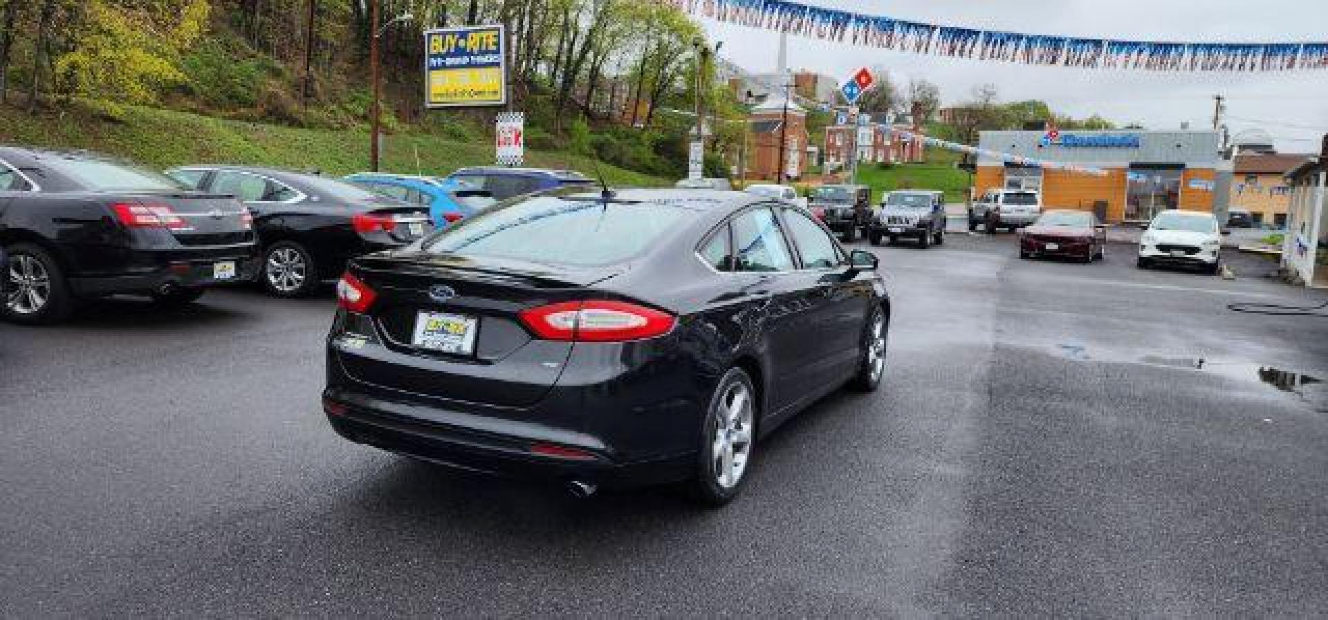 2015 BLACK /Charcoal Black Ford Fusion SE (3FA6P0H70FR) with an 2.5 L4 engine, AT transmission, located at 15520 McMullen Hwy SW, Belair, MD, 21502, (301) 729-3700, 39.581375, -78.846451 - FOR A BETTER PRICE CALL PAUL AT 301-268-8150 - Photo#11