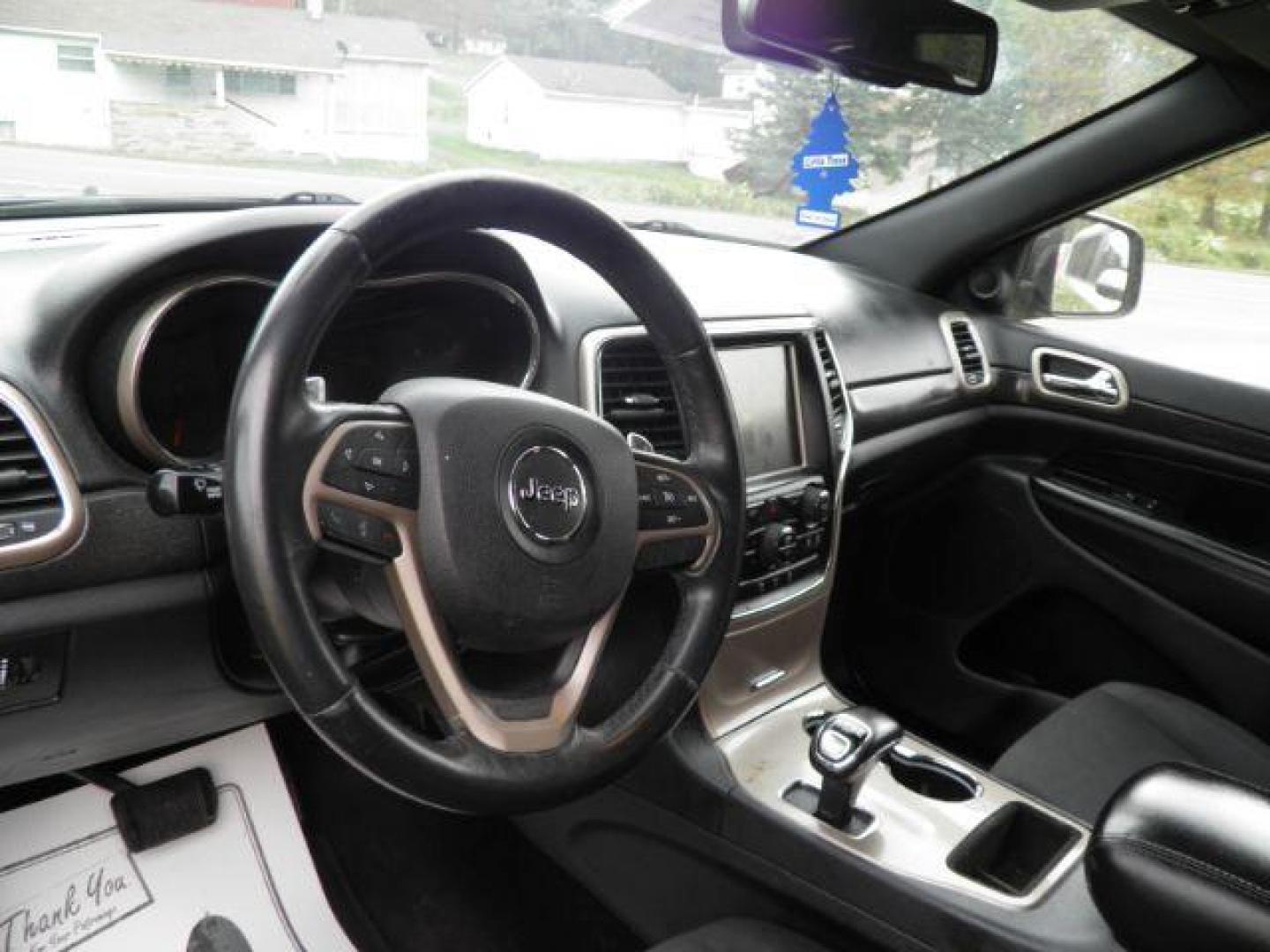 2015 BLACK Jeep Grand Cherokee Laredo 4WD (1C4RJFAG0FC) with an 3.6L V6 engine, AT transmission, located at 19521 New George's Creek Rd SW, Barton, MD, 21521, (301) 463-2404, 39.524323, -79.017906 - Photo#2