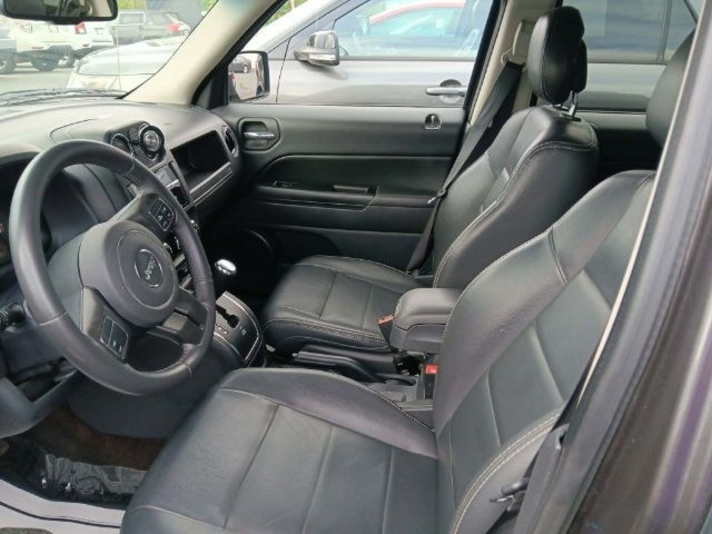 2015 GRAY Jeep Patriot High Altitude Edition (1C4NJRFB8FD) with an 2.4L L4 engine, AT transmission, located at 15520 McMullen Hwy SW, Belair, MD, 21502, (301) 729-3700, 39.581375, -78.846451- Photo#1