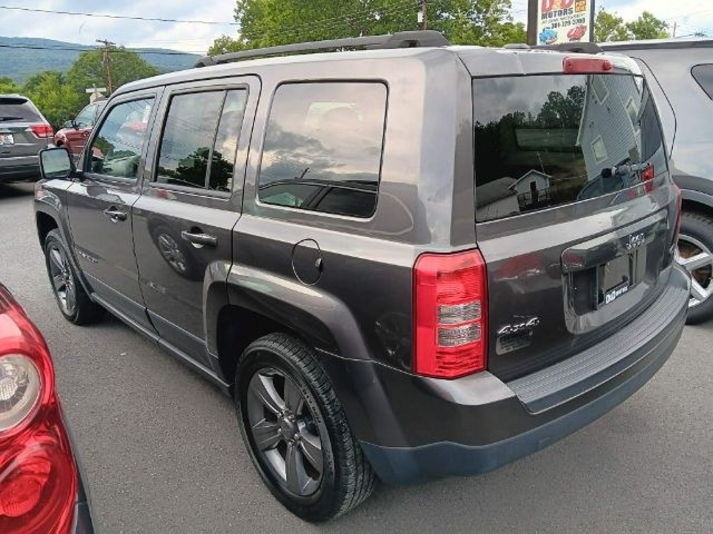 2015 GRAY Jeep Patriot High Altitude Edition (1C4NJRFB8FD) with an 2.4L L4 engine, AT transmission, located at 15520 McMullen Hwy SW, Belair, MD, 21502, (301) 729-3700, 39.581375, -78.846451- Photo#4