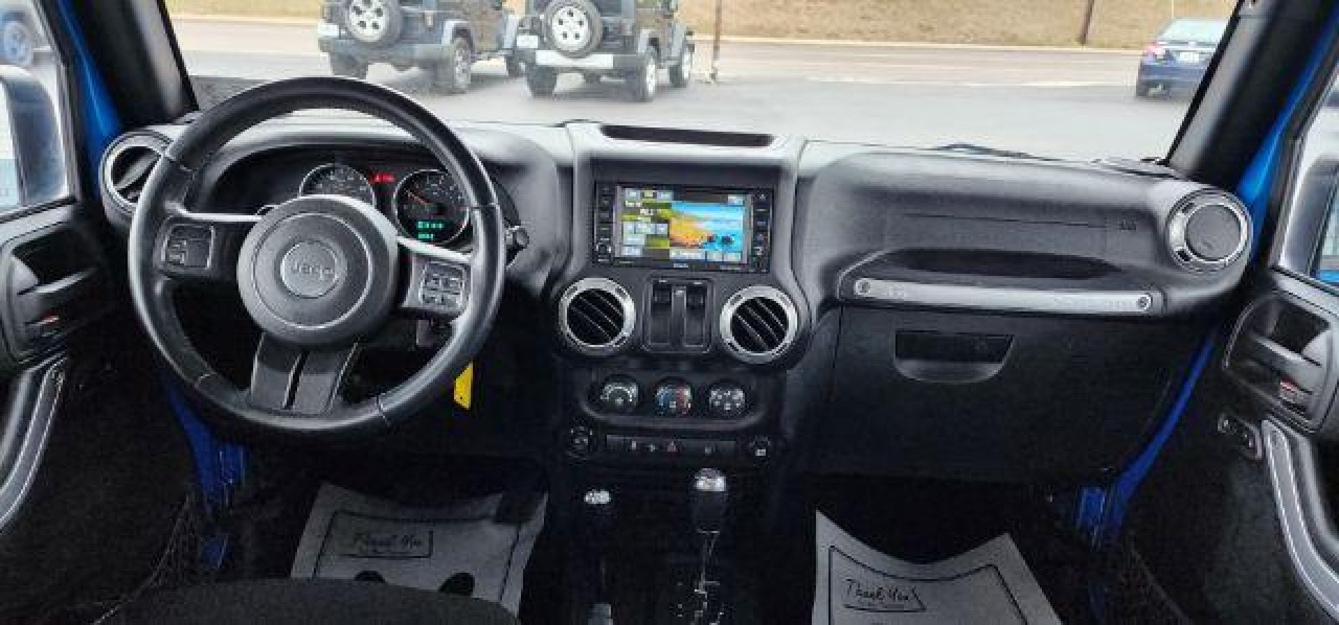 2015 BLUE /Black Jeep Wrangler Rubicon (1C4BJWCGXFL) with an 3.6L V6 engine, AT transmission, located at 15520 McMullen Hwy SW, Belair, MD, 21502, (301) 729-3700, 39.581375, -78.846451 - Photo#4