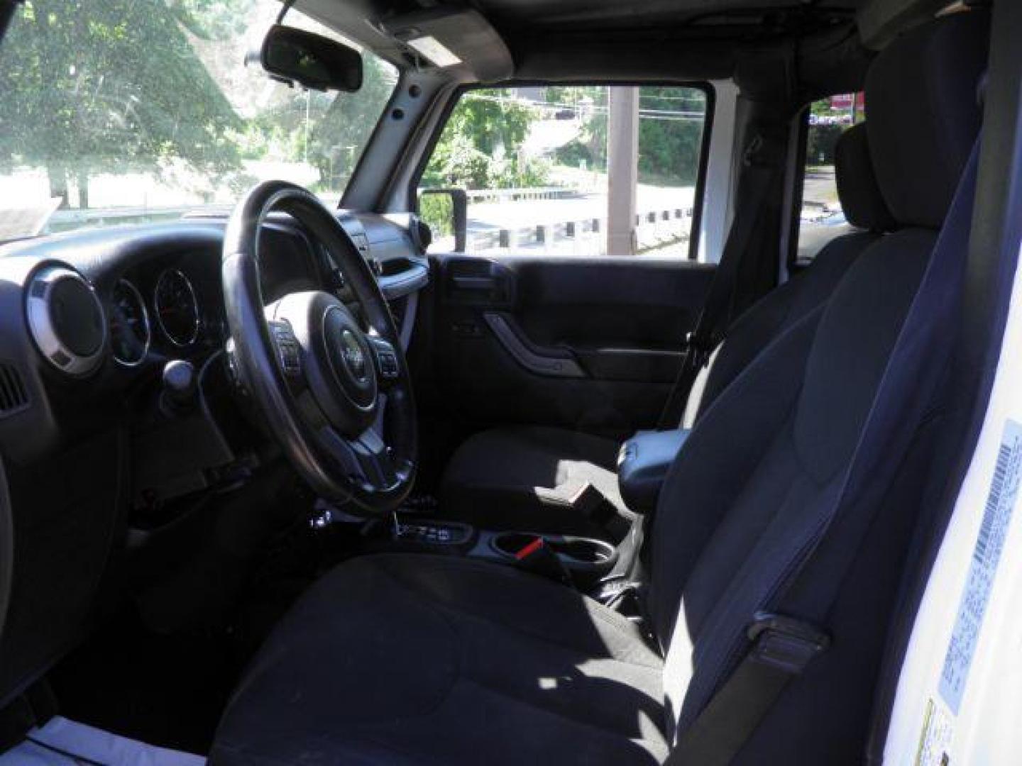 2015 WHITE Jeep Wrangler Unlimited Sport 4WD (1C4BJWDGXFL) with an 3.6l V6 engine, AT transmission, located at 19521 New George's Creek Rd SW, Barton, MD, 21521, (301) 463-2404, 39.524323, -79.017906 - Photo#1