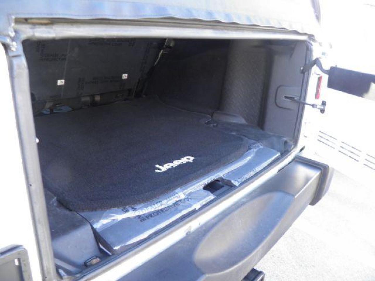 2015 White Jeep Wrangler Unlimited Sport (1C4BJWDGXFL) with an 3.6L V6 engine, MAN transmission, located at 15520 McMullen Hwy SW, Belair, MD, 21502, (301) 729-3700, 39.581375, -78.846451 - Photo#4