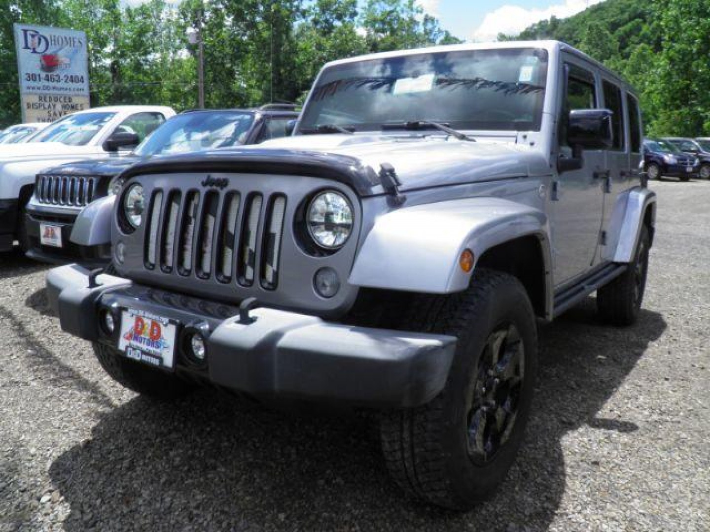 2015 SILVER Jeep Wrangler Unlimited Altitude (1C4BJWEG3FL) with an 3.6L V6 engine, located at 15520 McMullen Hwy SW, Belair, MD, 21502, (301) 729-3700, 39.581375, -78.846451- Photo#0