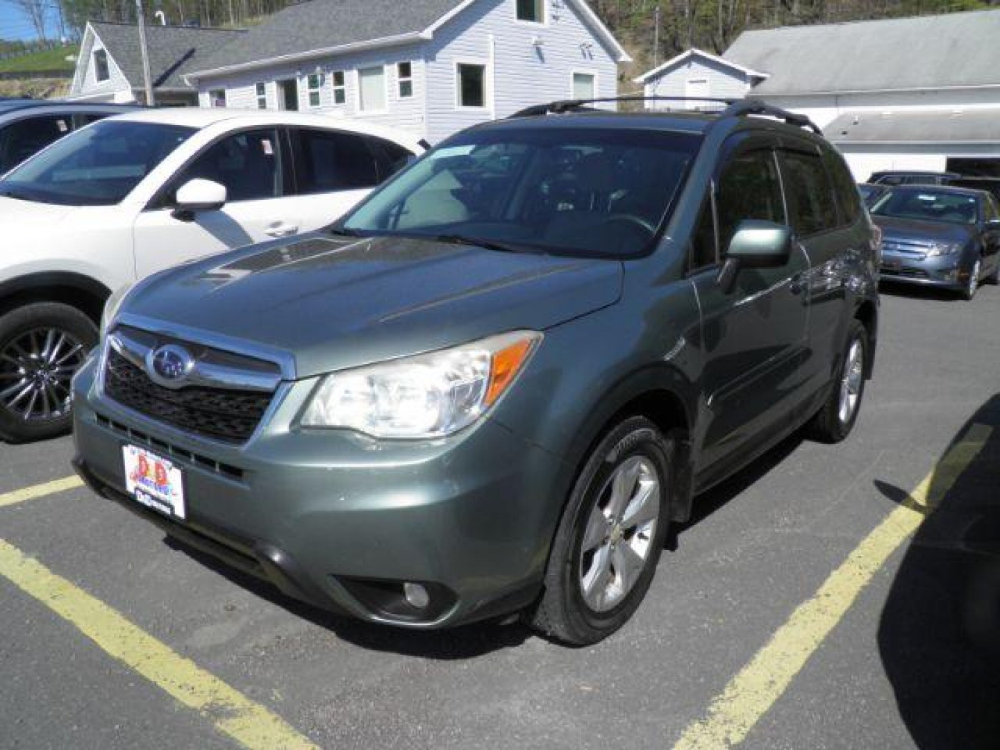 2015 GREEN Subaru Forester 2.5i Premium (JF2SJADC9FG) with an 2.5 L4 engine, 5/SP transmission, located at 15520 McMullen Hwy SW, Belair, MD, 21502, (301) 729-3700, 39.581375, -78.846451 - Photo#0