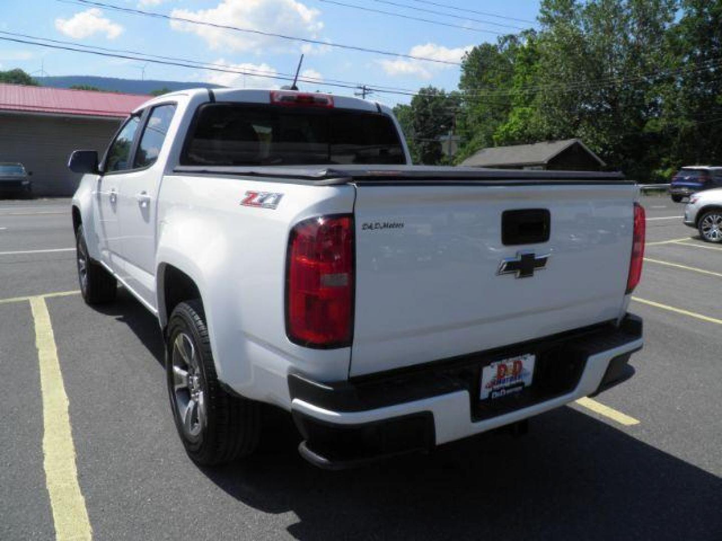 2016 White Chevrolet Colorado Z71 (1GCGTDE37G1) with an 3.6L V6 engine, AT transmission, located at 15520 McMullen Hwy SW, Belair, MD, 21502, (301) 729-3700, 39.581375, -78.846451 - Photo#4