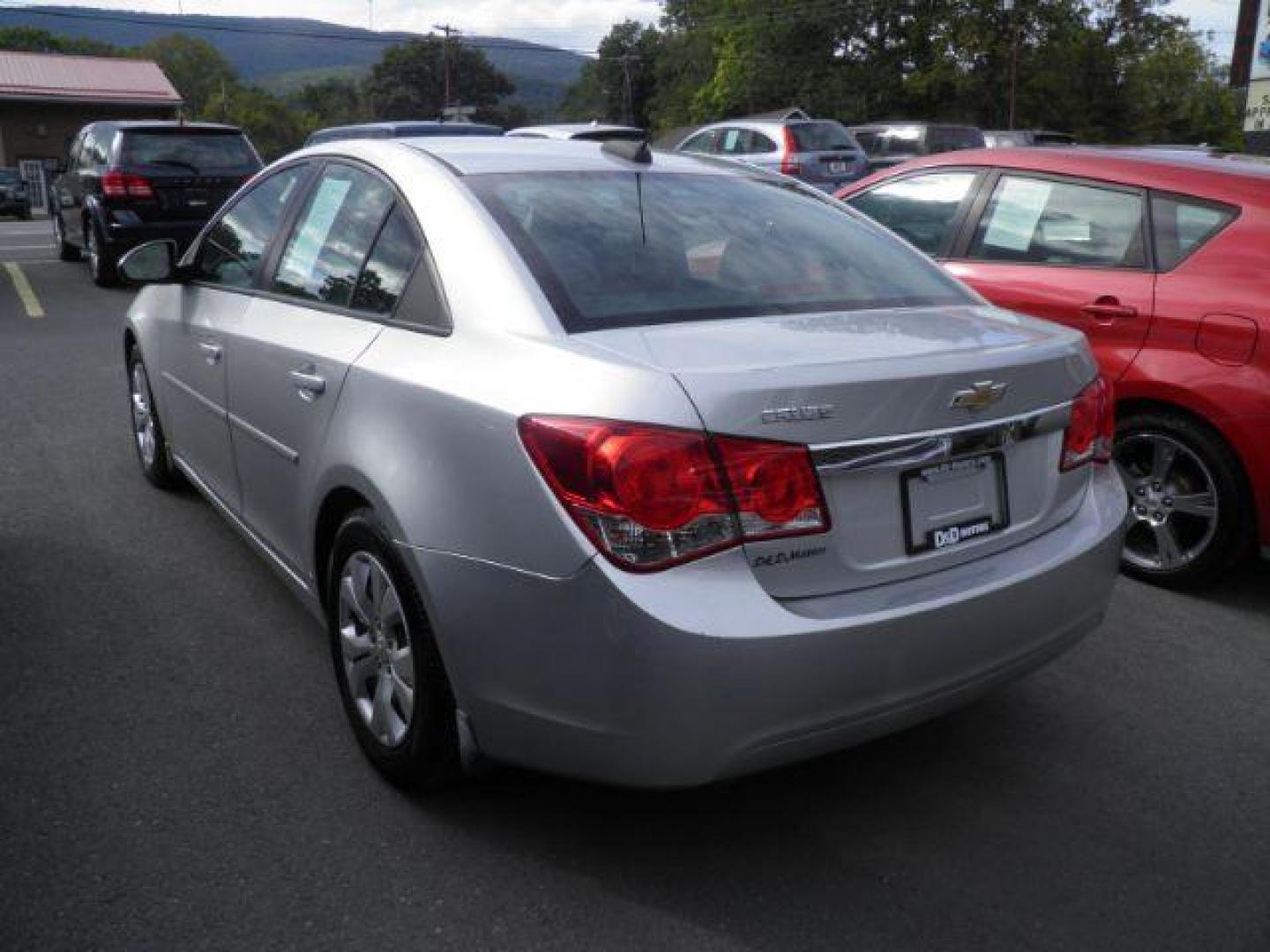 2016 Silver Chevrolet Cruze Limited LS Auto (1G1PC5SHXG7) with an 1.8L I4 engine, AT transmission, located at 15520 McMullen Hwy SW, Belair, MD, 21502, (301) 729-3700, 39.581375, -78.846451 - Photo#4