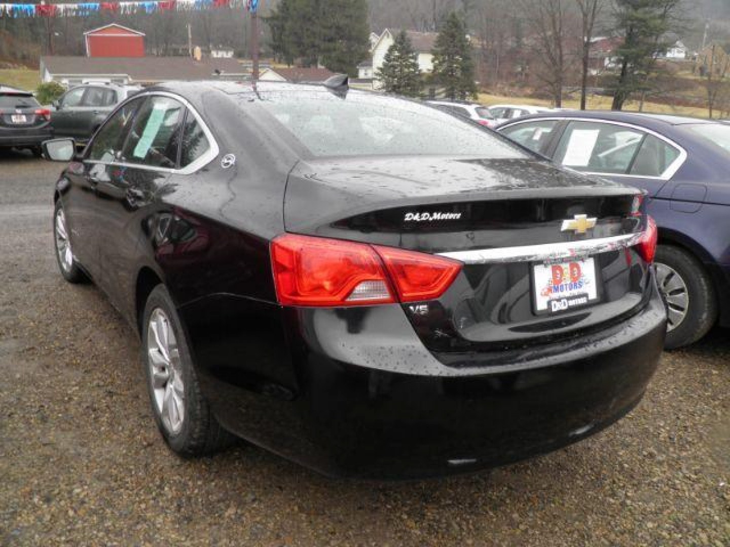 2016 Black Chevrolet Impala LT (2G1115S33G9) with an 3.6L V6 engine, AT transmission, located at 19521 New George's Creek Rd SW, Barton, MD, 21521, (301) 463-2404, 39.524323, -79.017906 - Photo#4