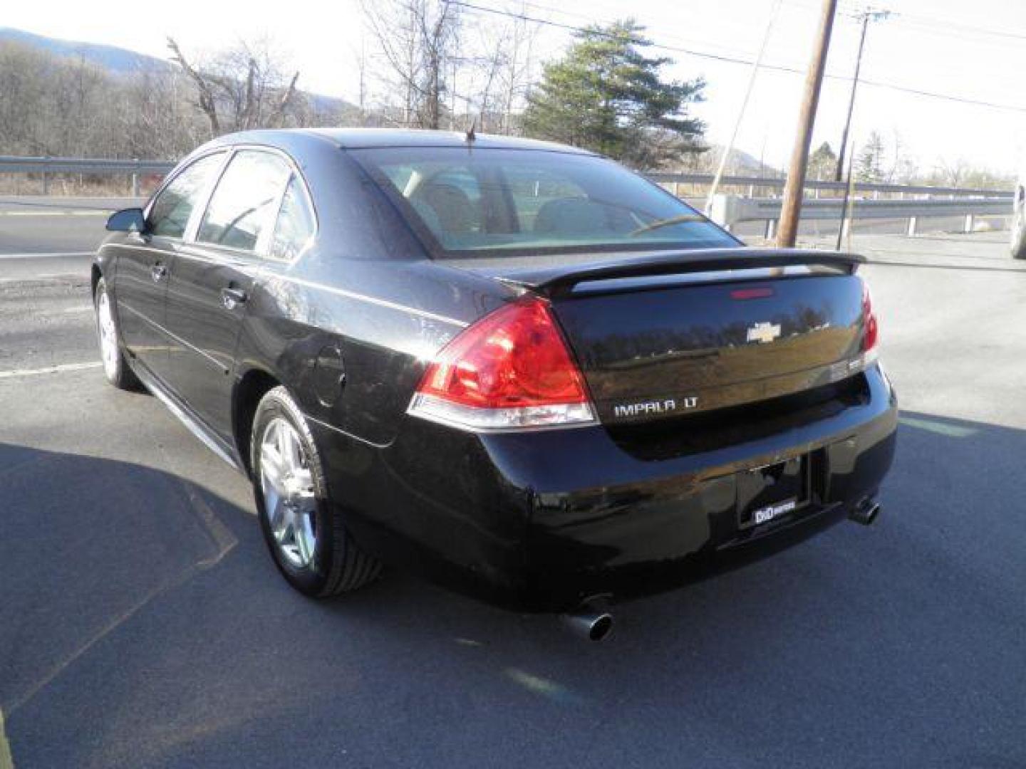 2016 BLACK Chevrolet Impala Limited LT Fleet (2G1WB5E39G1) with an 3.6L V6 engine, AT transmission, located at 19521 New George's Creek Rd SW, Barton, MD, 21521, (301) 463-2404, 39.524323, -79.017906 - Photo#4