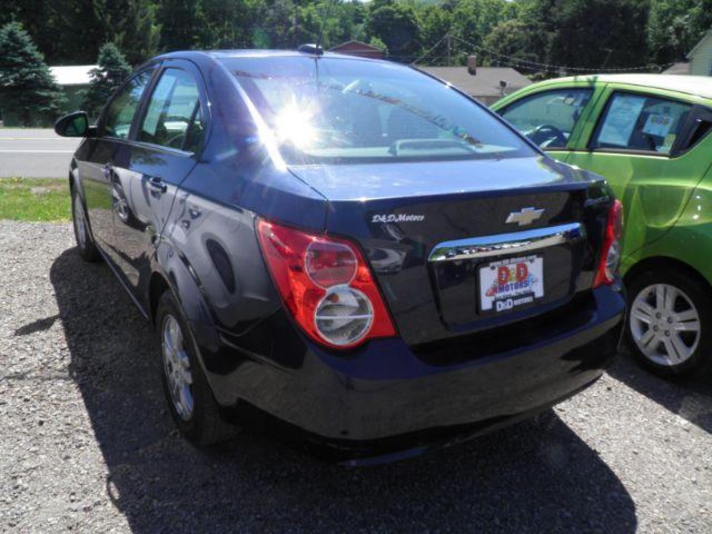 2016 Blue Chevrolet Sonic LT Auto Sedan (1G1JC5SH8G4) with an 1.8L I4 engine, AT transmission, located at 19521 New George's Creek Rd SW, Barton, MD, 21521, (301) 463-2404, 39.524323, -79.017906 - Photo#4
