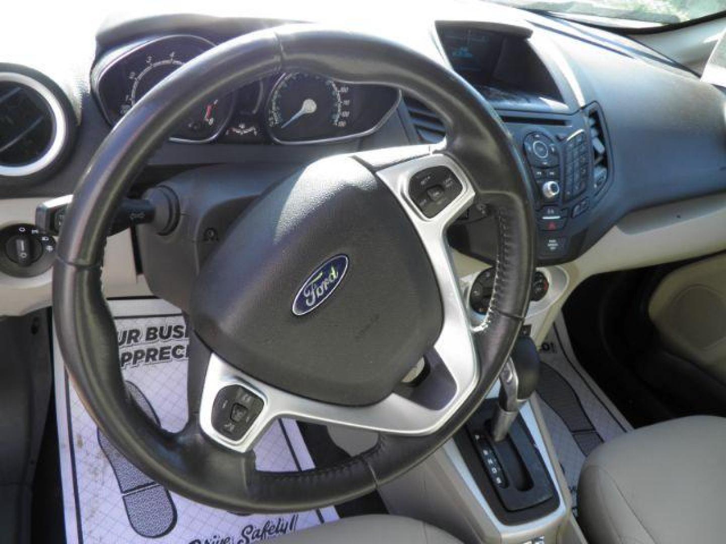2016 Gray Ford Fiesta SE Hatchback (3FADP4EJXGM) with an 1.6L I4 engine, AT transmission, located at 19521 New George's Creek Rd SW, Barton, MD, 21521, (301) 463-2404, 39.524323, -79.017906 - Photo#2