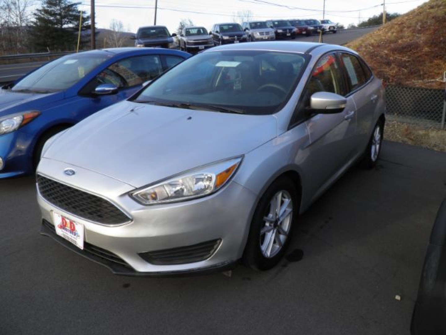 2016 Silver Ford Focus SE Sedan (1FADP3F24GL) with an 2.0L I4 engine, AT transmission, located at 15520 McMullen Hwy SW, Belair, MD, 21502, (301) 729-3700, 39.581375, -78.846451- Photo#0