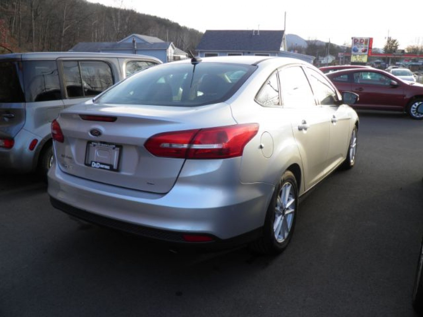 2016 Silver Ford Focus SE Sedan (1FADP3F24GL) with an 2.0L I4 engine, AT transmission, located at 15520 McMullen Hwy SW, Belair, MD, 21502, (301) 729-3700, 39.581375, -78.846451- Photo#3