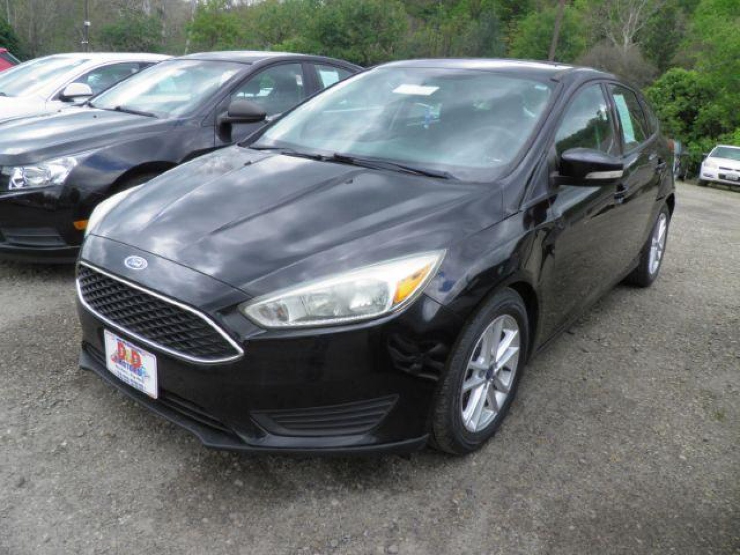 2016 BLACK Ford Focus SE Hatch (1FADP3K29GL) with an 2.0L L4 engine, AT transmission, located at 19521 New George's Creek Rd SW, Barton, MD, 21521, (301) 463-2404, 39.524323, -79.017906- Photo#0