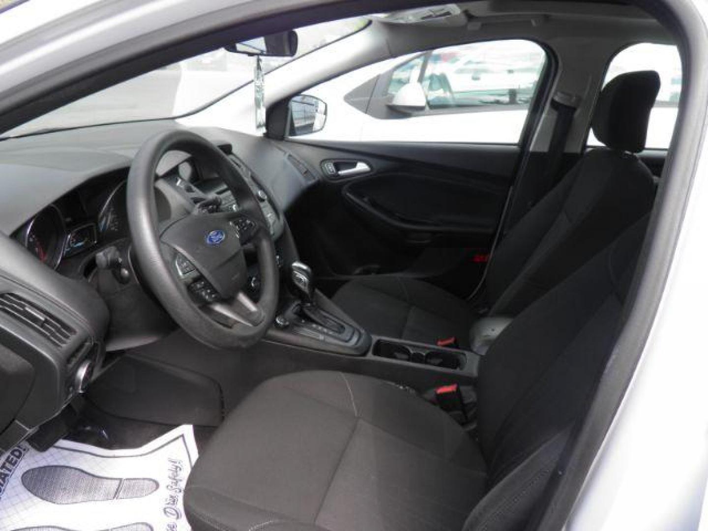 2016 White Ford Focus SE Hatch (1FADP3K25GL) with an 2.0L I4 engine, AT transmission, located at 15520 McMullen Hwy SW, Belair, MD, 21502, (301) 729-3700, 39.581375, -78.846451 - Photo#1