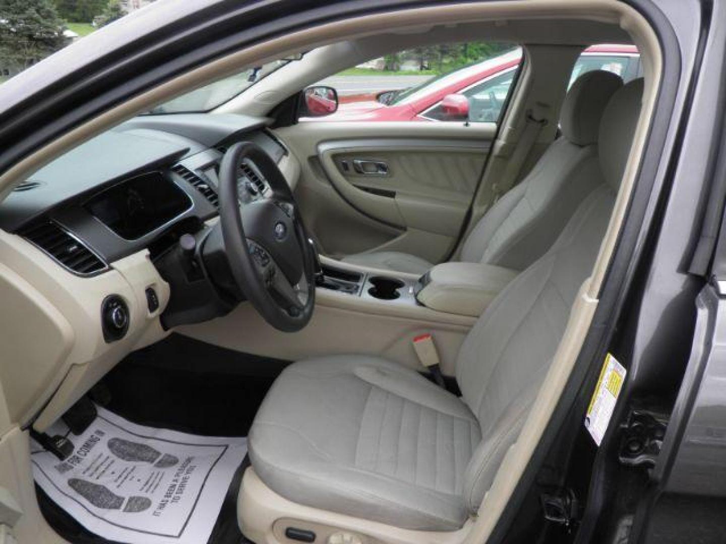 2016 GRAY Ford Taurus SE (1FAHP2D88GG) with an 2.4L L4 engine, AT transmission, located at 19521 New George's Creek Rd SW, Barton, MD, 21521, (301) 463-2404, 39.524323, -79.017906 - Photo#1