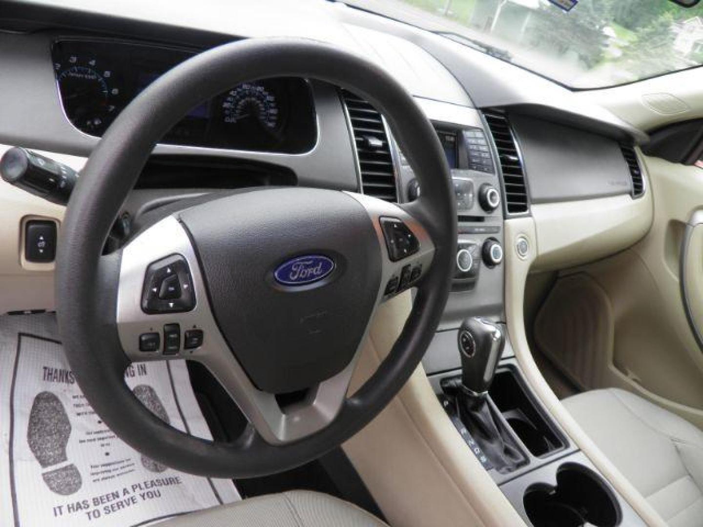 2016 GRAY Ford Taurus SE (1FAHP2D88GG) with an 2.4L L4 engine, AT transmission, located at 19521 New George's Creek Rd SW, Barton, MD, 21521, (301) 463-2404, 39.524323, -79.017906 - Photo#2