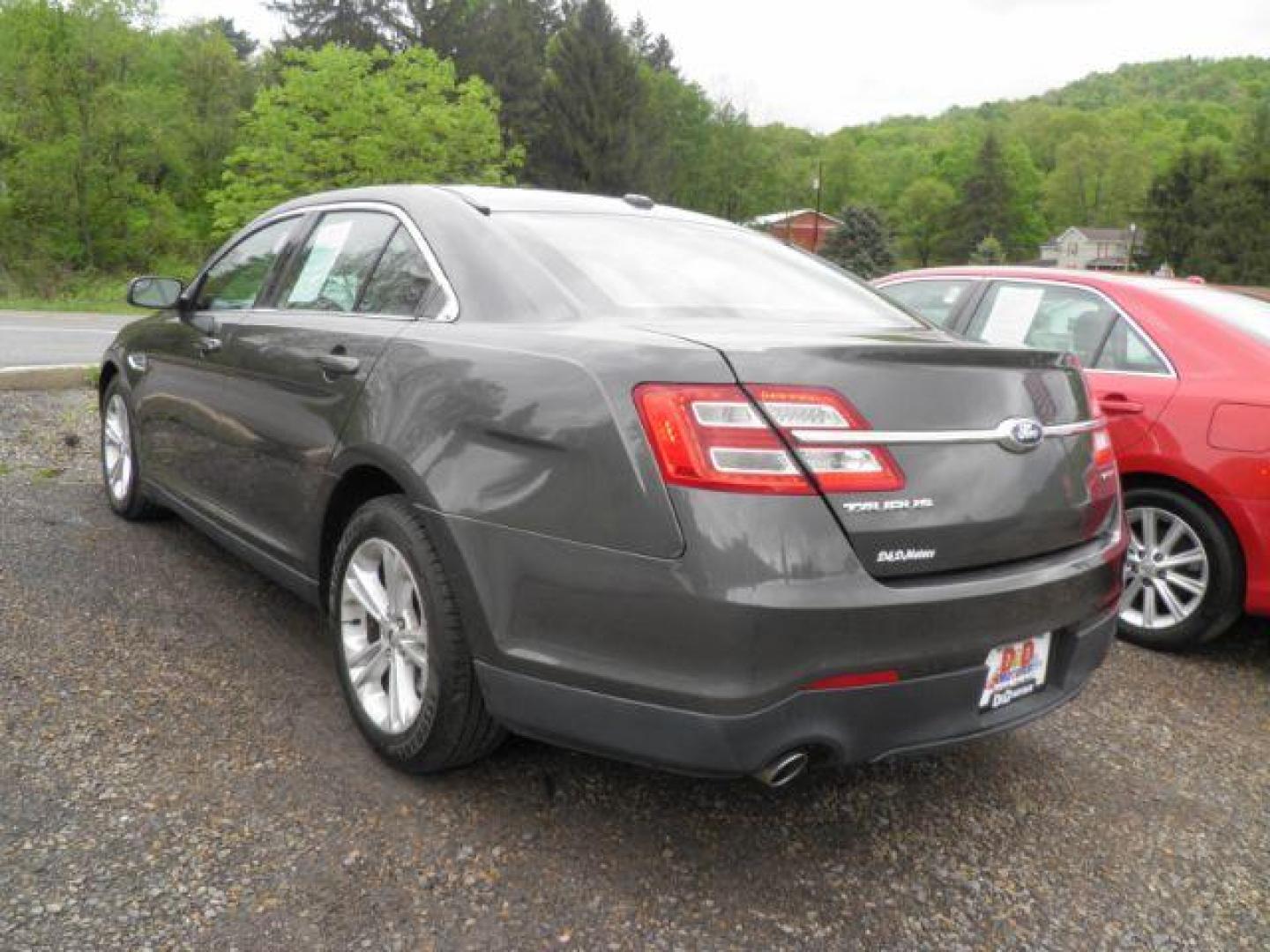 2016 GRAY Ford Taurus SE (1FAHP2D88GG) with an 2.4L L4 engine, AT transmission, located at 19521 New George's Creek Rd SW, Barton, MD, 21521, (301) 463-2404, 39.524323, -79.017906 - Photo#4