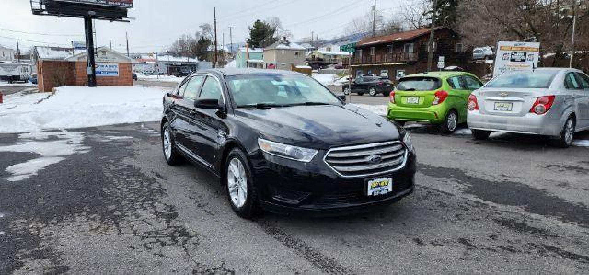 2016 Black /Cloth Ford Taurus SE (1FAHP2D81GG) with an 3.5L V6 engine, AT transmission, located at 15520 McMullen Hwy SW, Belair, MD, 21502, (301) 729-3700, 39.581375, -78.846451 - FOR A BETTER PRICE CALL PAUL AT 301-268-8150 - Photo#0