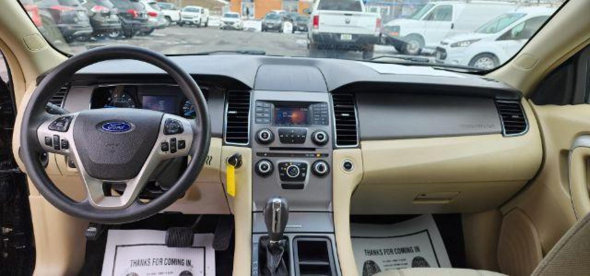 2016 Black /Cloth Ford Taurus SE (1FAHP2D81GG) with an 3.5L V6 engine, AT transmission, located at 15520 McMullen Hwy SW, Belair, MD, 21502, (301) 729-3700, 39.581375, -78.846451 - FOR A BETTER PRICE CALL PAUL AT 301-268-8150 - Photo#5
