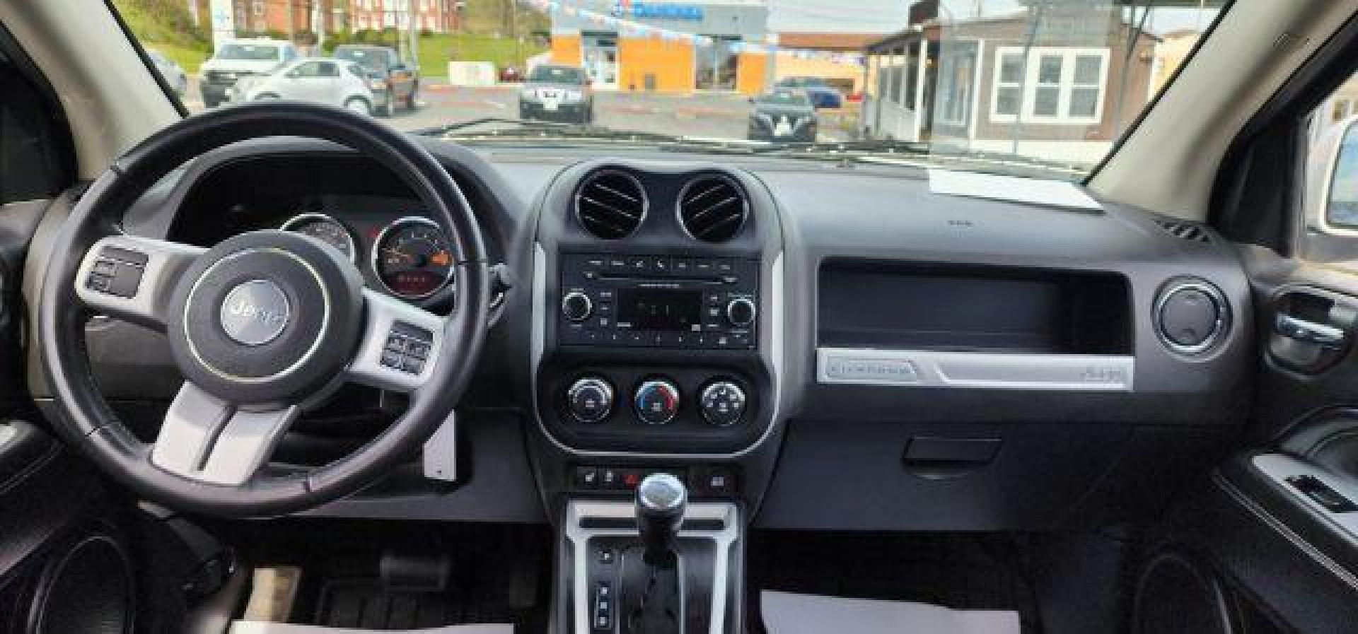 2016 WHITE /Dark Slate Gray/Light Pebble Beige, vinyl/cloth Jeep Compass Latitude 4WD (1C4NJDEB8GD) with an 2.4L L4 engine, AT transmission, located at 15520 McMullen Hwy SW, Belair, MD, 21502, (301) 729-3700, 39.581375, -78.846451 - Photo#4