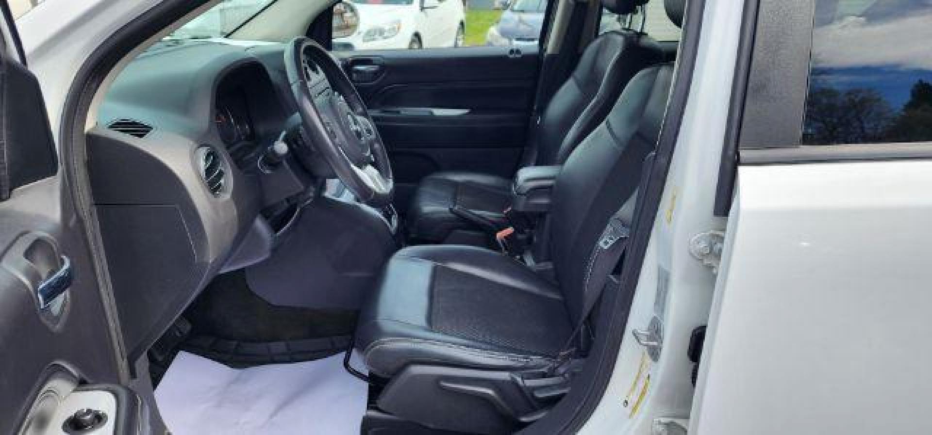 2016 WHITE /Dark Slate Gray/Light Pebble Beige, vinyl/cloth Jeep Compass Latitude 4WD (1C4NJDEB8GD) with an 2.4L L4 engine, AT transmission, located at 15520 McMullen Hwy SW, Belair, MD, 21502, (301) 729-3700, 39.581375, -78.846451 - Photo#7